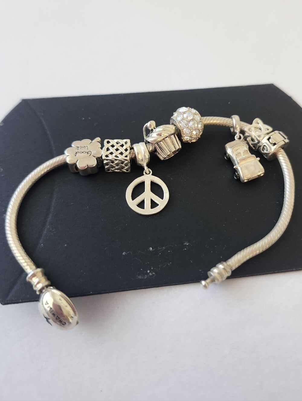 Chamilia Sterling Silver Bracelet 7.5" with 8 Decorative Charms